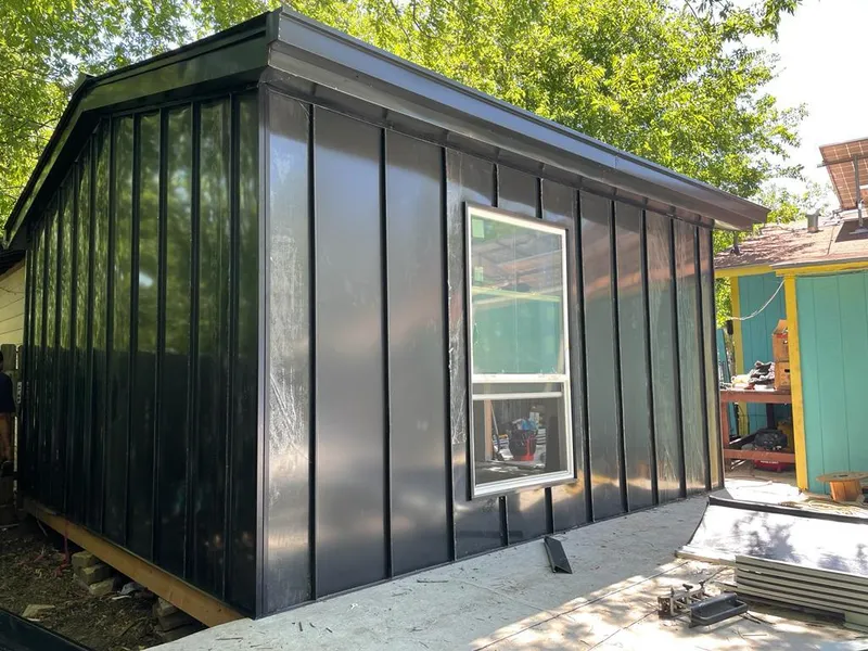 Black standing seam metal wall panels for Metal Roof Installation in Spanish Lake