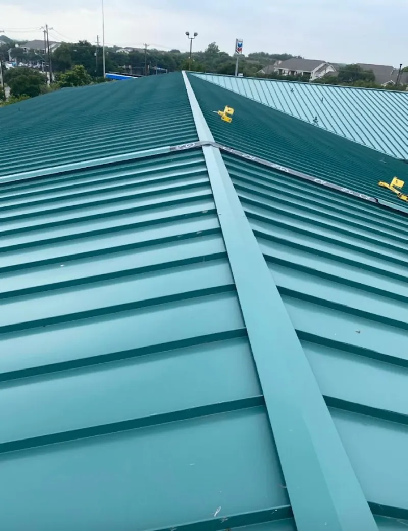 Green commercial metal roof ridge and valley for Metal Roof Repair in Spanish Lake